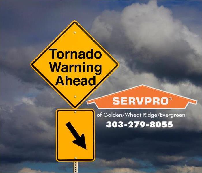 A tornado warning sign is posted. 