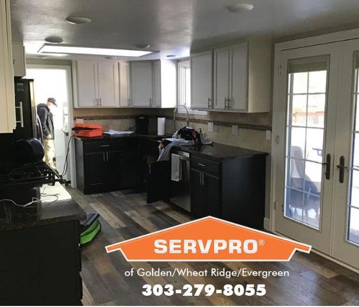 SERVPRO of Golden Technicians are in the pre-mitigation process of a kitchen water damage restoration.