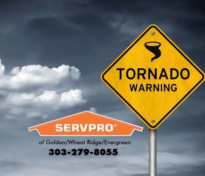 A tornado warning sign is posted. 